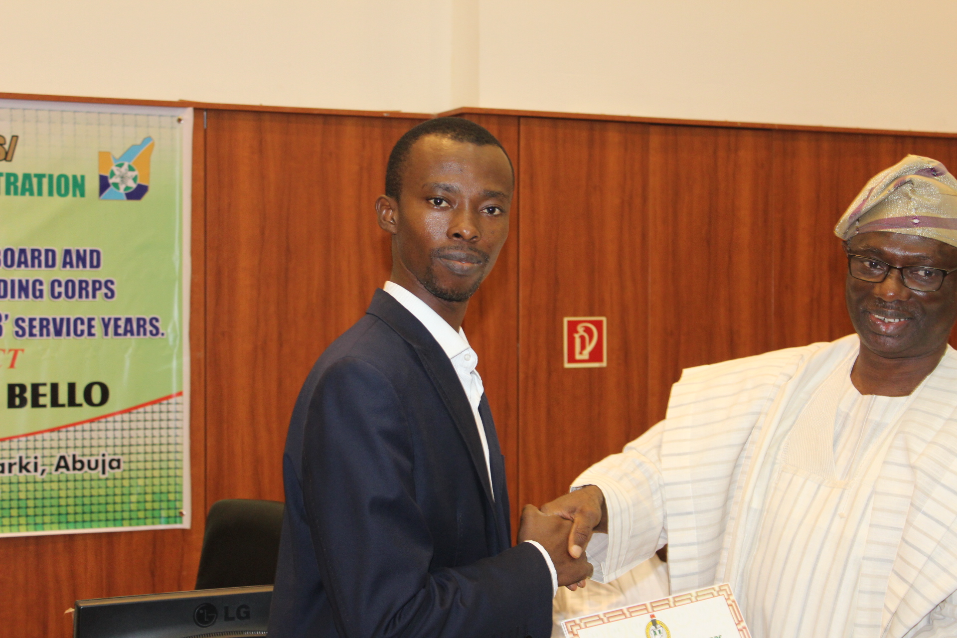 Joseph Osuigwe receiving award for his anti-human trafficking projects